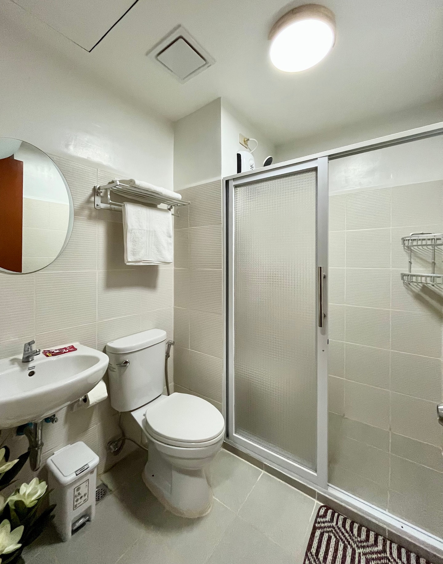 Clean bathroom with hot shower